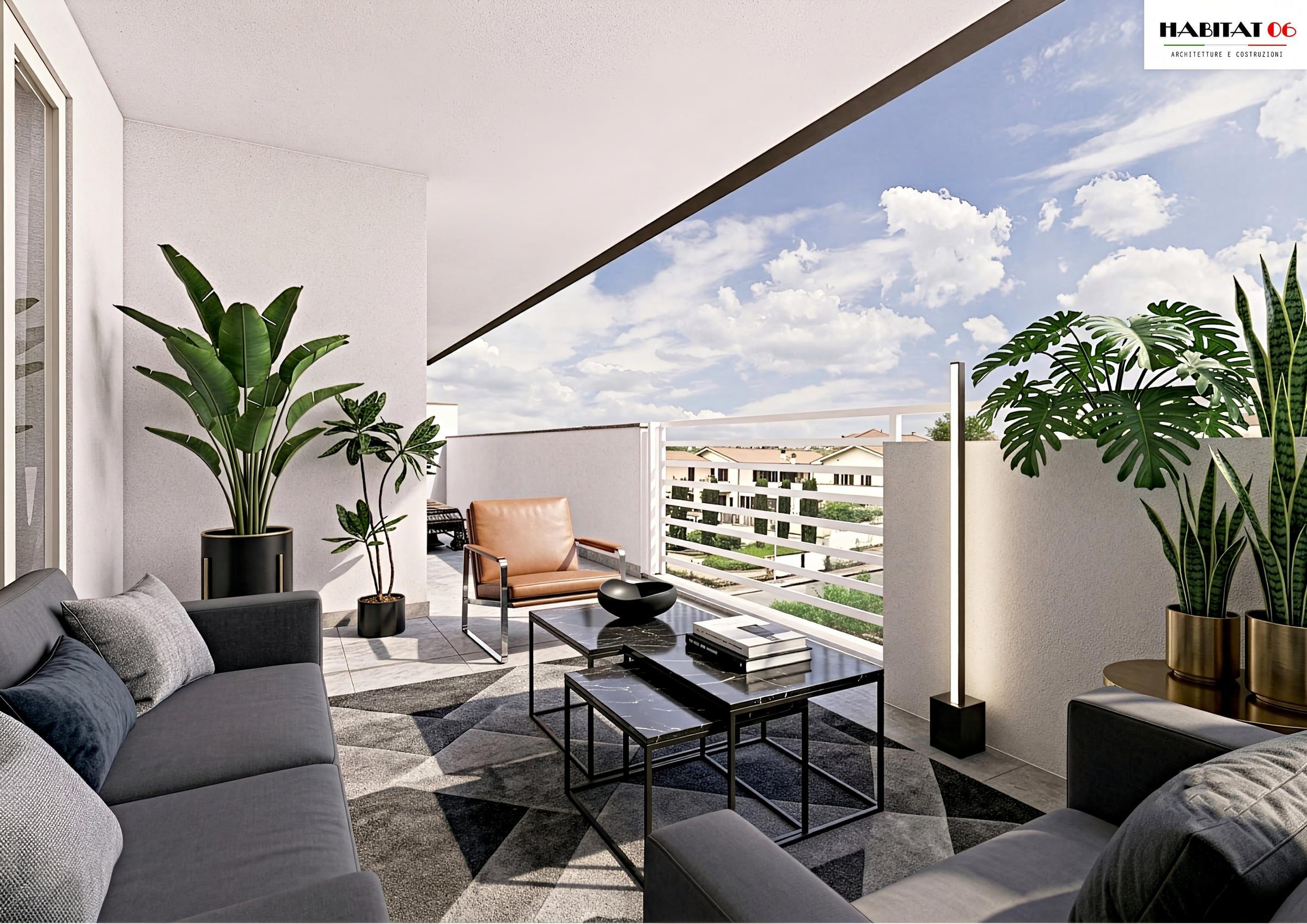 Terrazza coperta di un appartamento al piano primo, arredata con divani e piante, vista sul quartiere