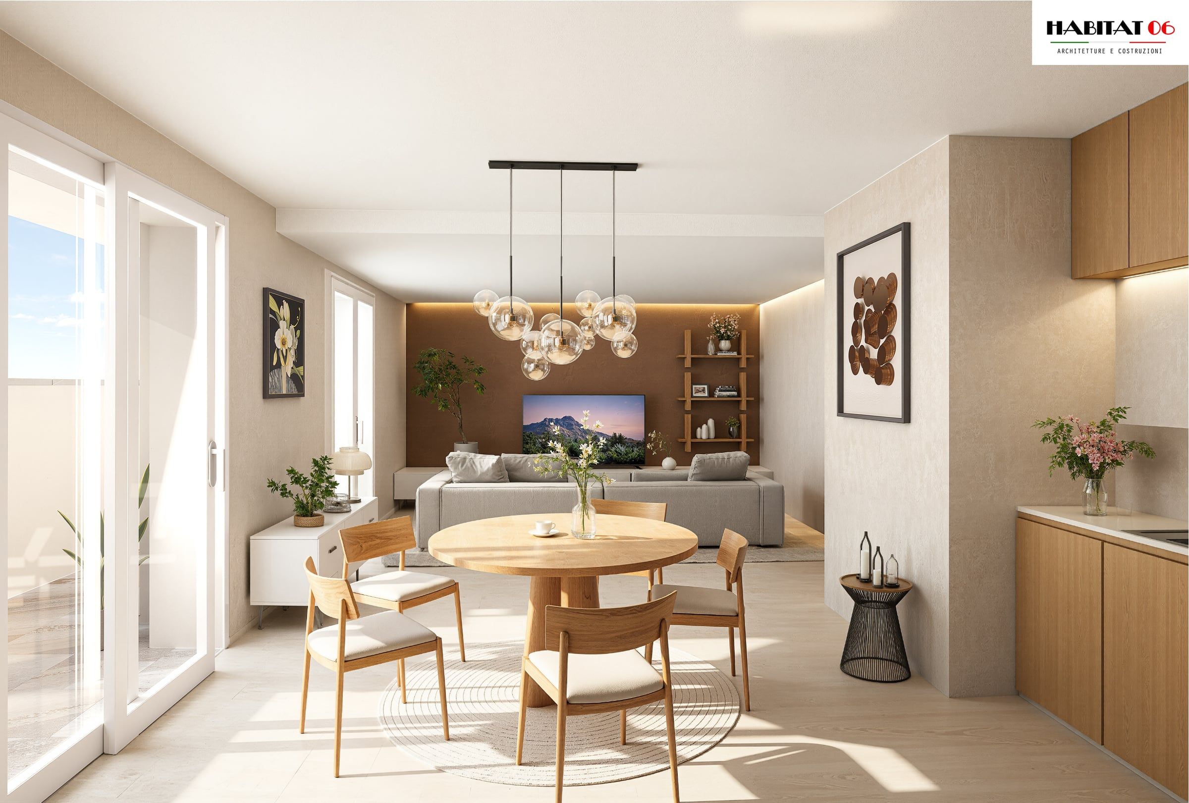 Zona giorno luminosa con tavolo rotondo, cucina a destra e grandi finestre a sinistra